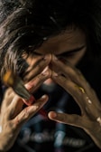 A close-up of hands creating art with paint.photography by photograper karim magico.