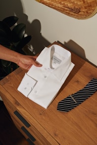 white printer paper on brown wooden table