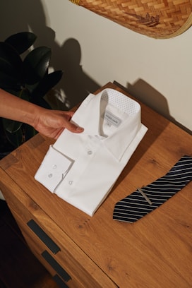 white printer paper on brown wooden table