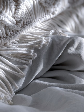 Close-up of a plush throw blanket perfect for winter nights.