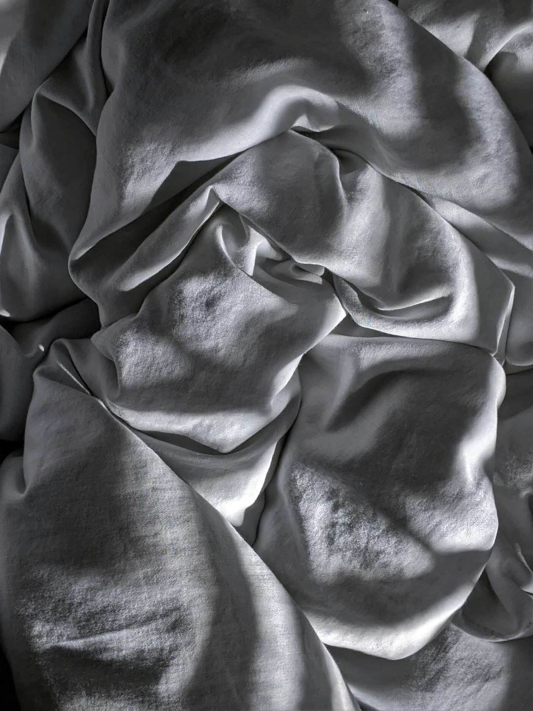 gray textile on brown wooden table