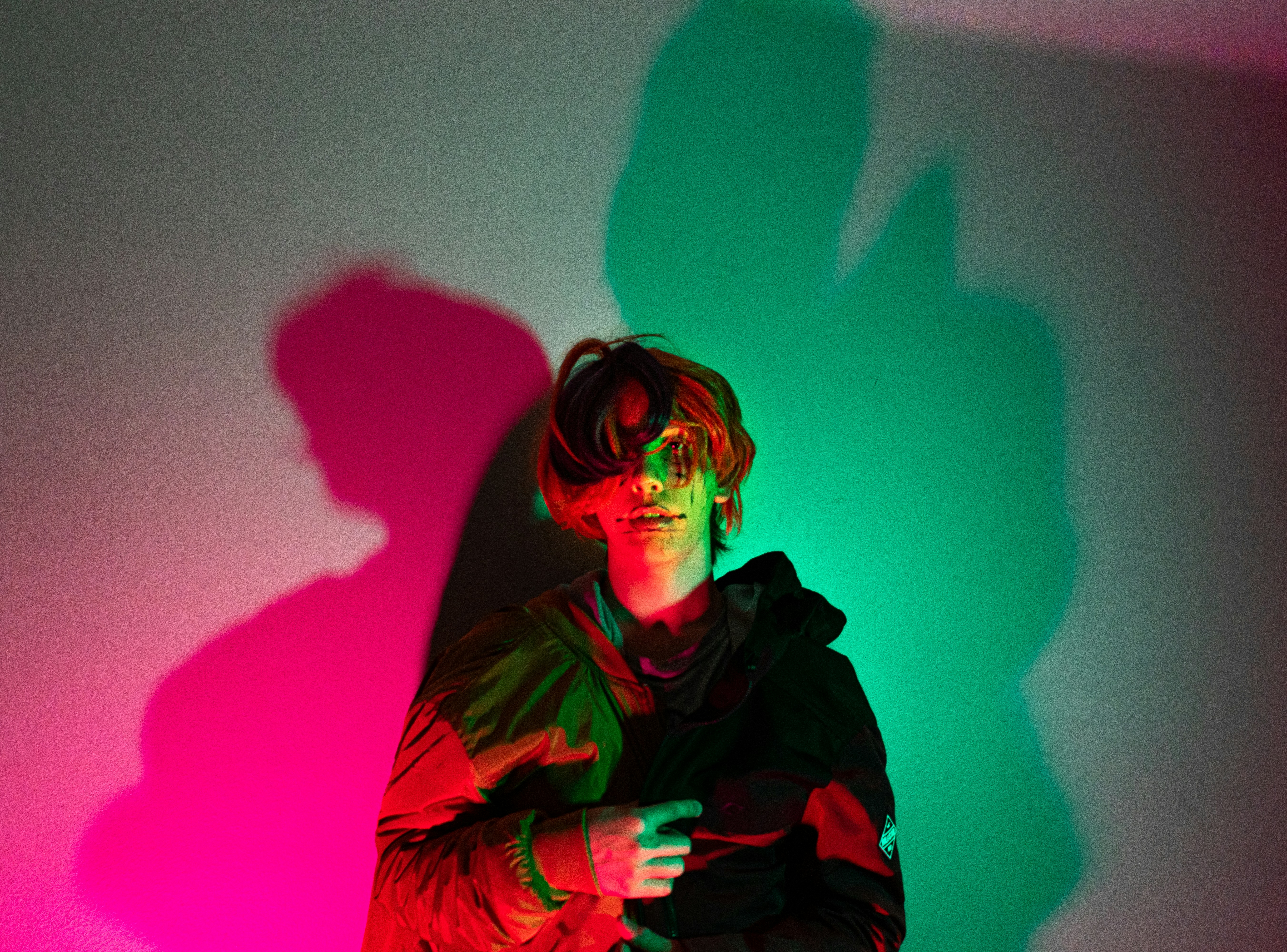 woman in black and green jacket