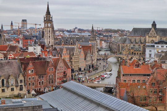 brown and white concrete buildings during daytime in Gent Belgium