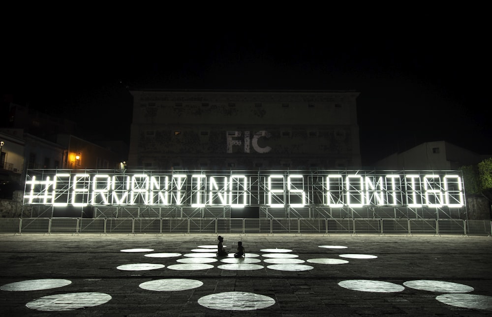 white and black lighted signage during night time