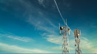 black metal tower under blue sky