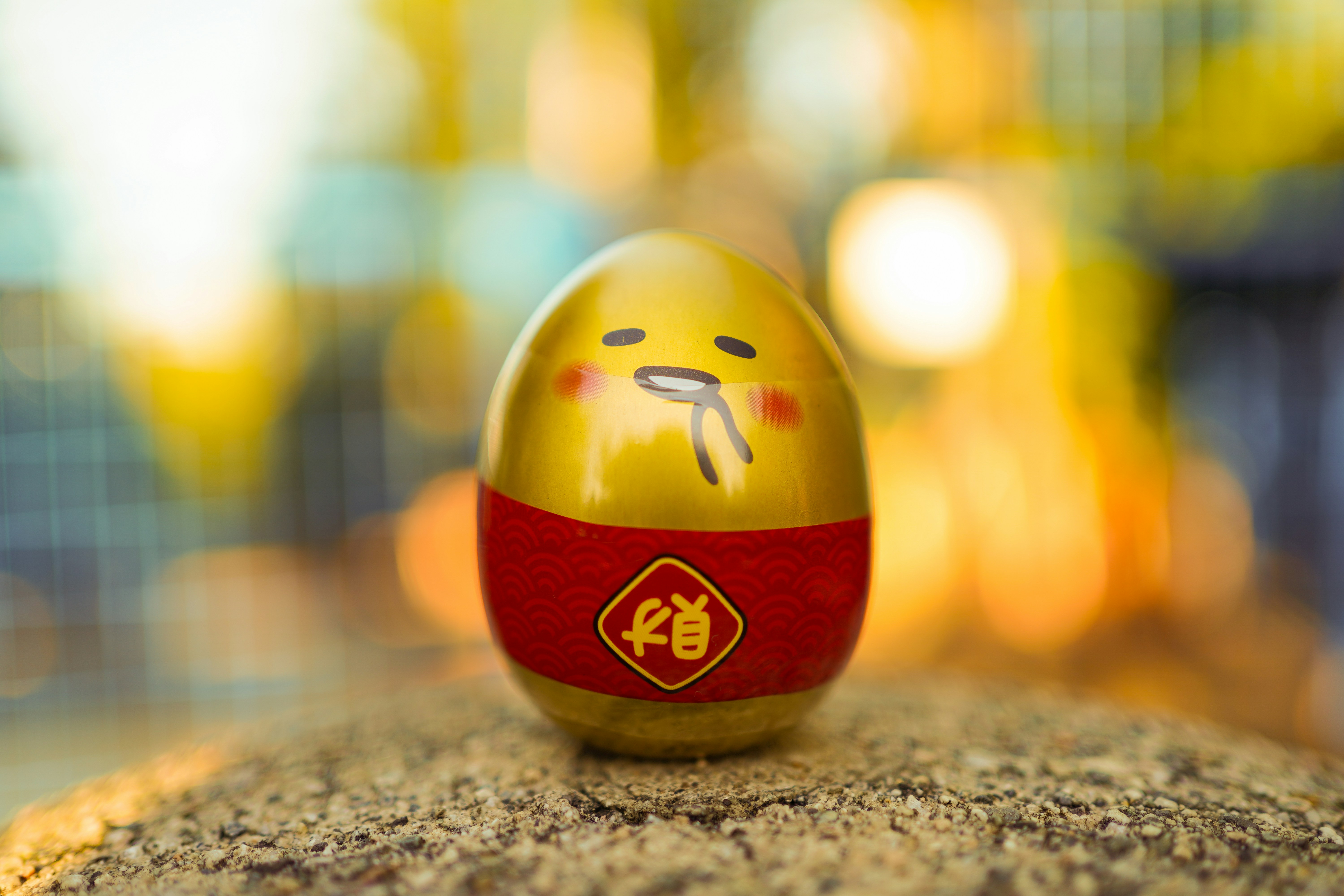 red and white ceramic egg figurine
