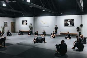 A vibrant assortment of MMA gear arranged neatly on a training mat.