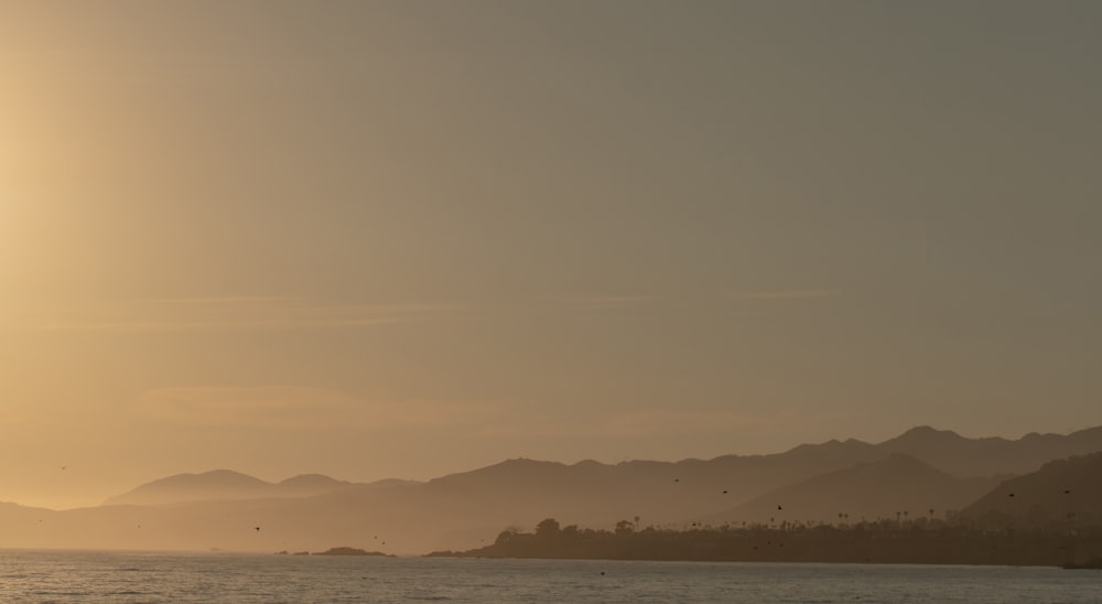 silhouette of mountains during daytime