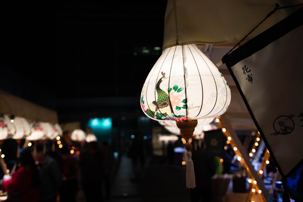 white and green floral pendant lamp