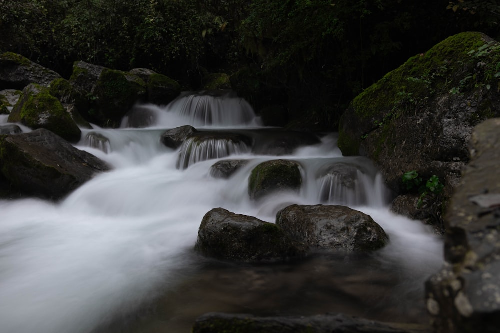 time lapse photography of water falls