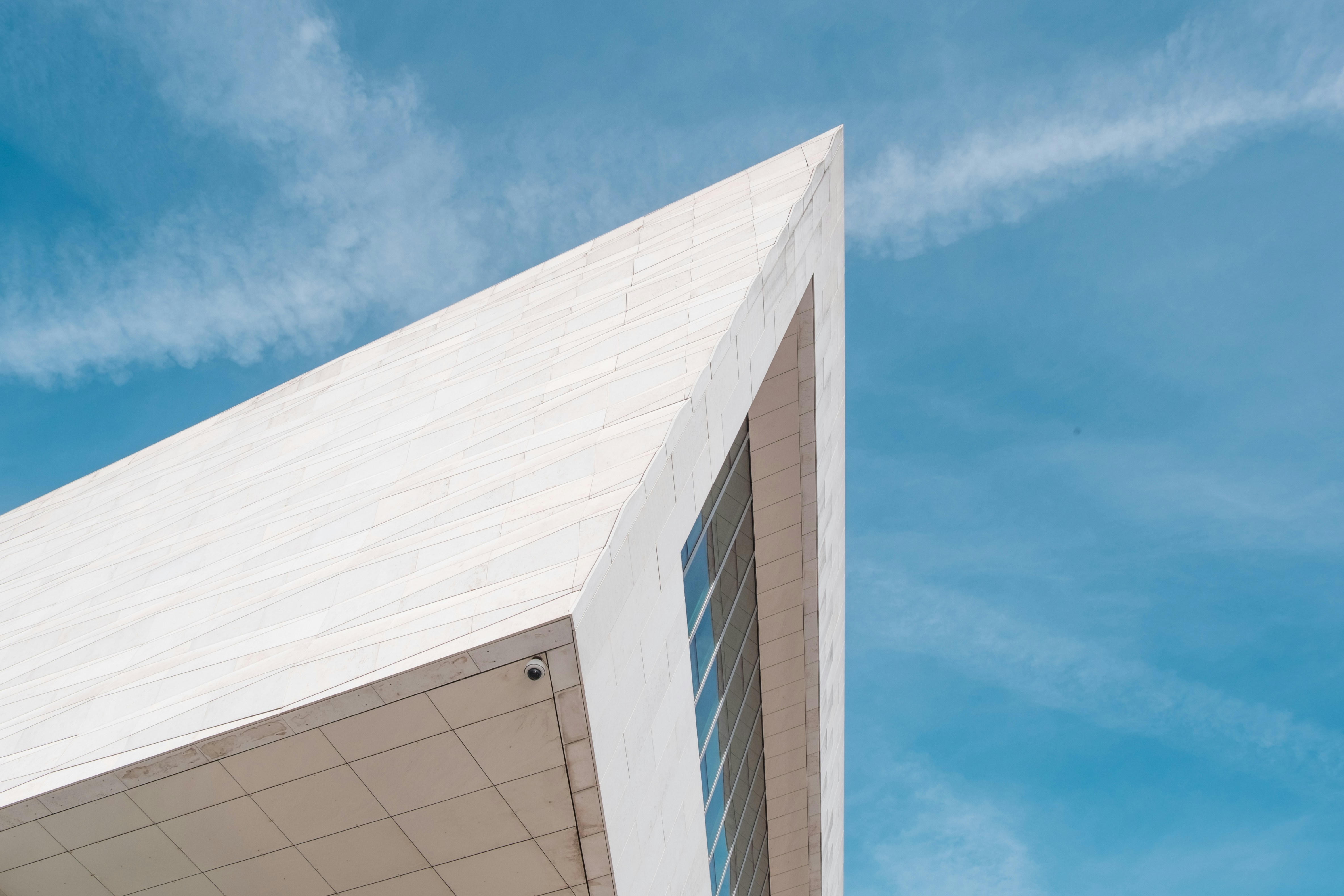 white concrete building under blue sky during daytime