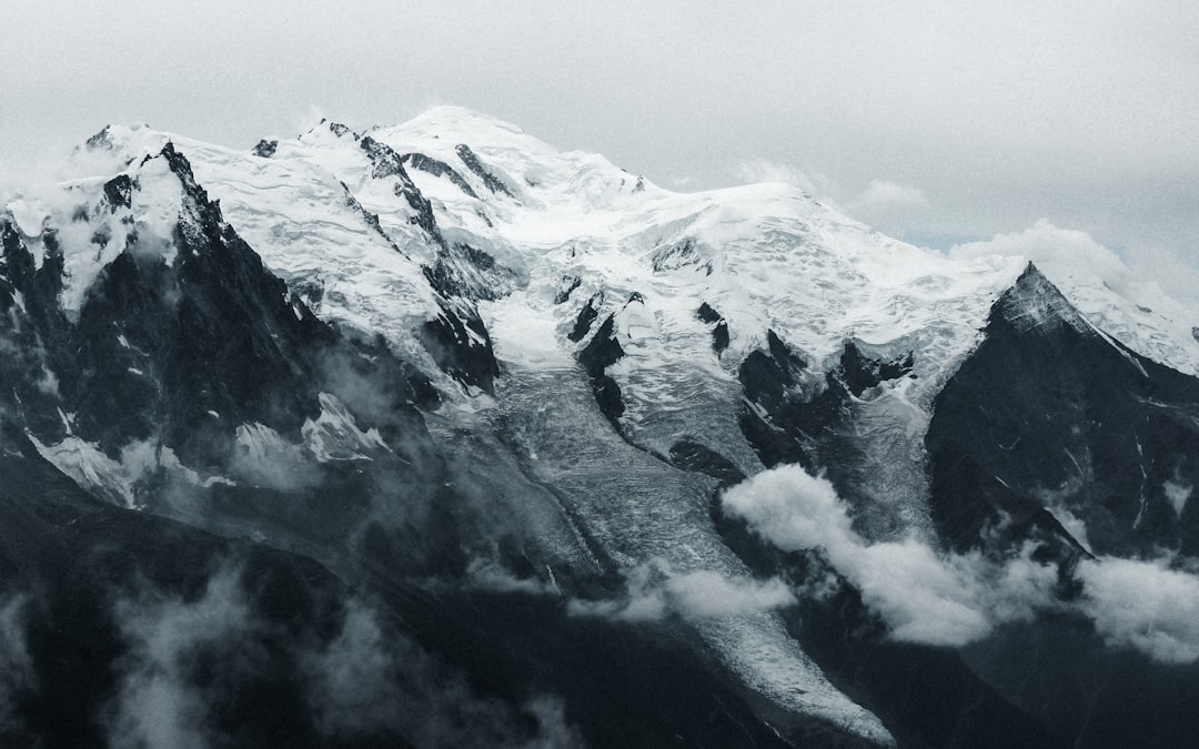 snow covered mountain during daytime