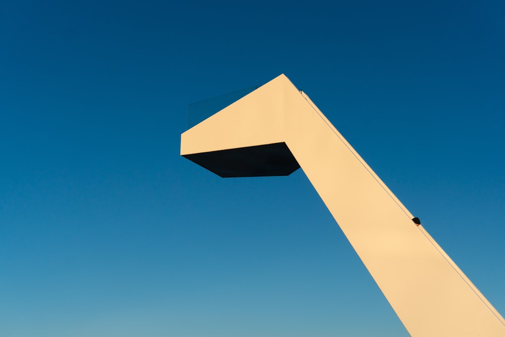 white concrete building under blue sky during daytime