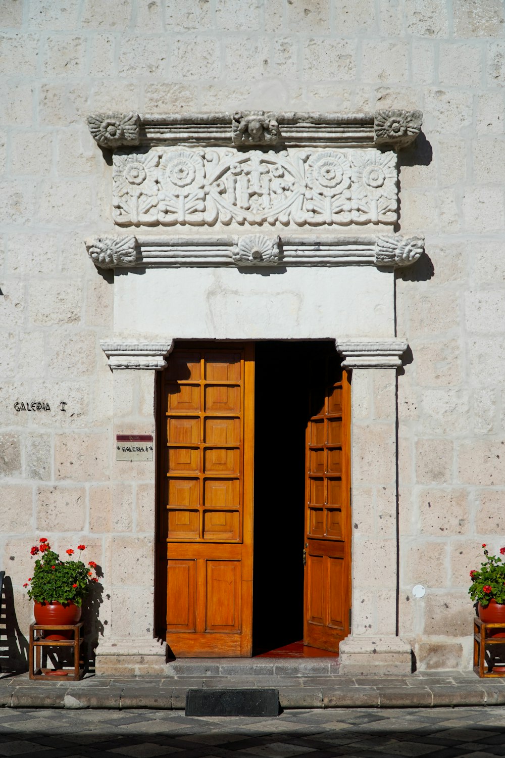 a couple of wooden doors sitting next to each other