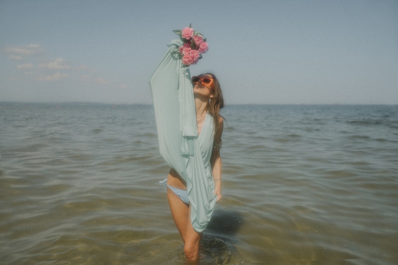 Elegant beach woman in white dress