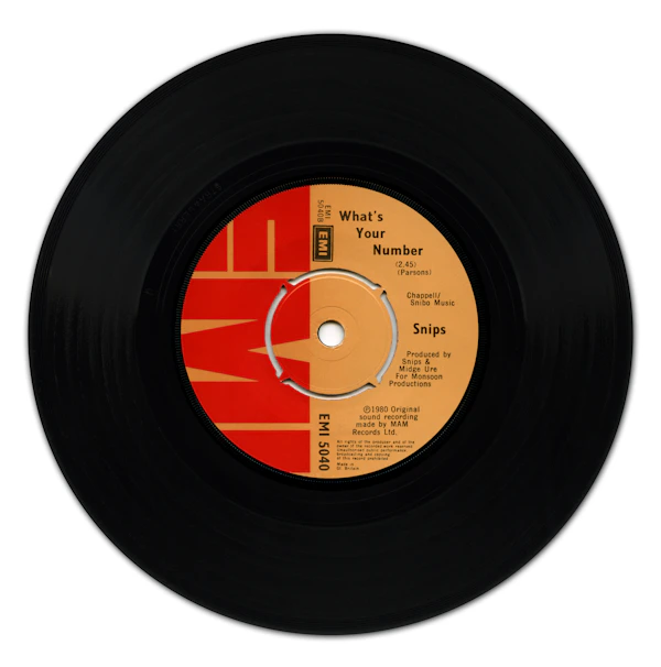 Stacked vinyl records in warm ambient light