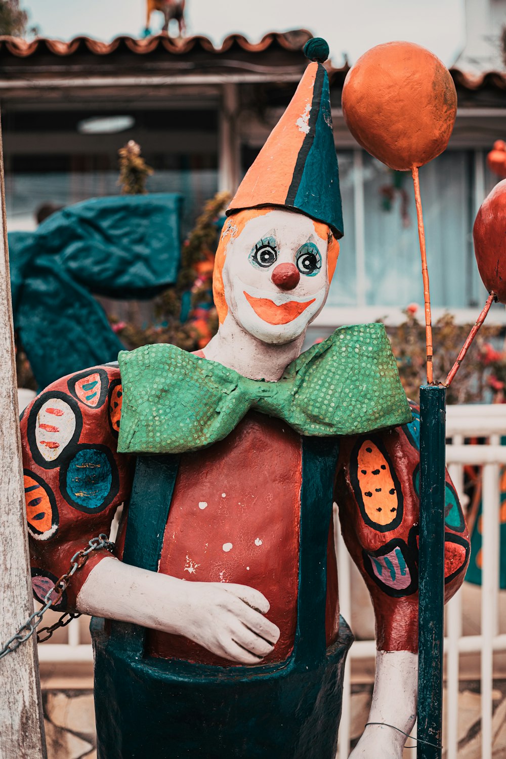 red and white clown figurine