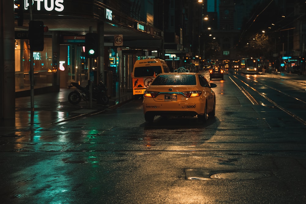 yellow car on road during daytime