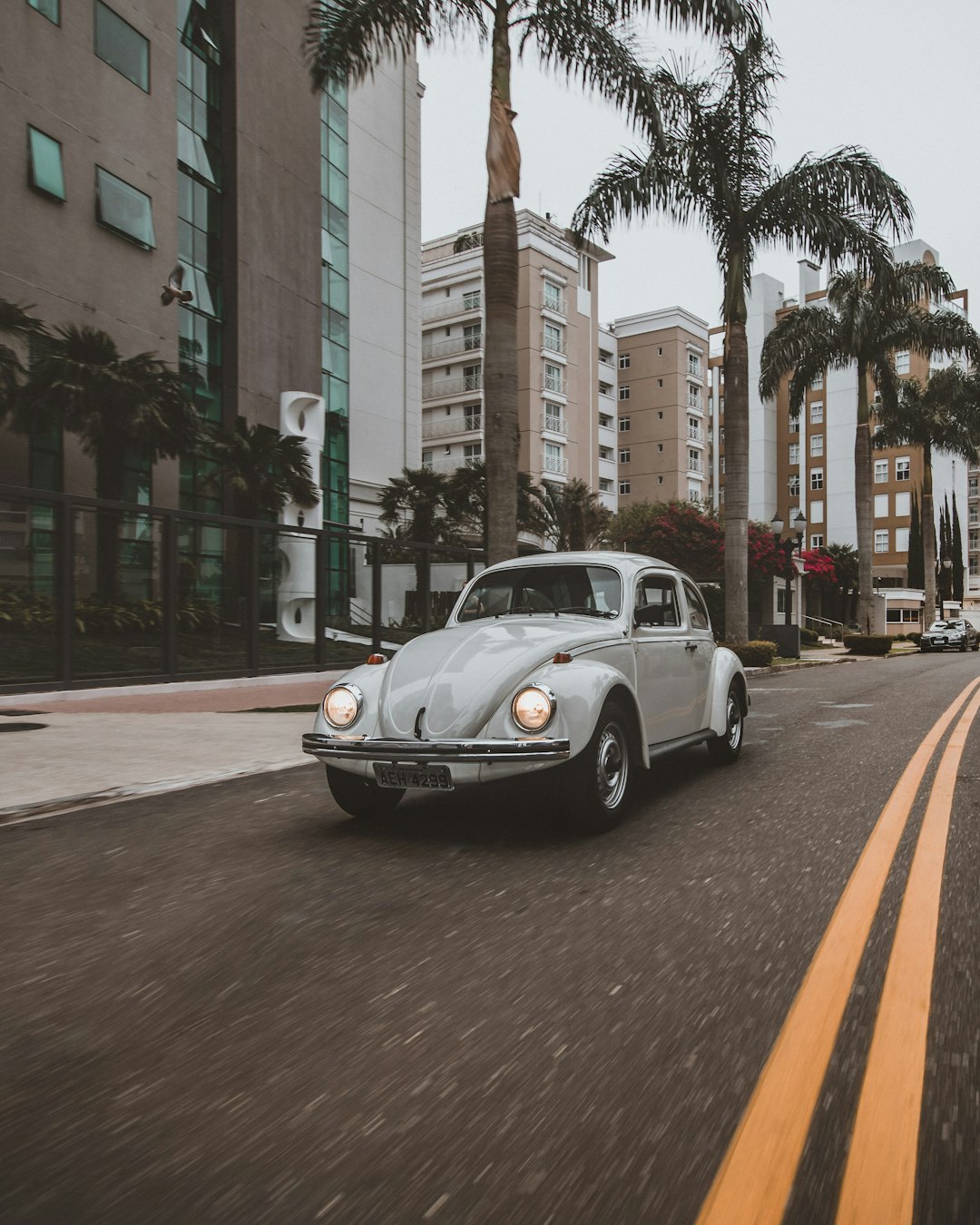 white porsche 911 on road during daytime