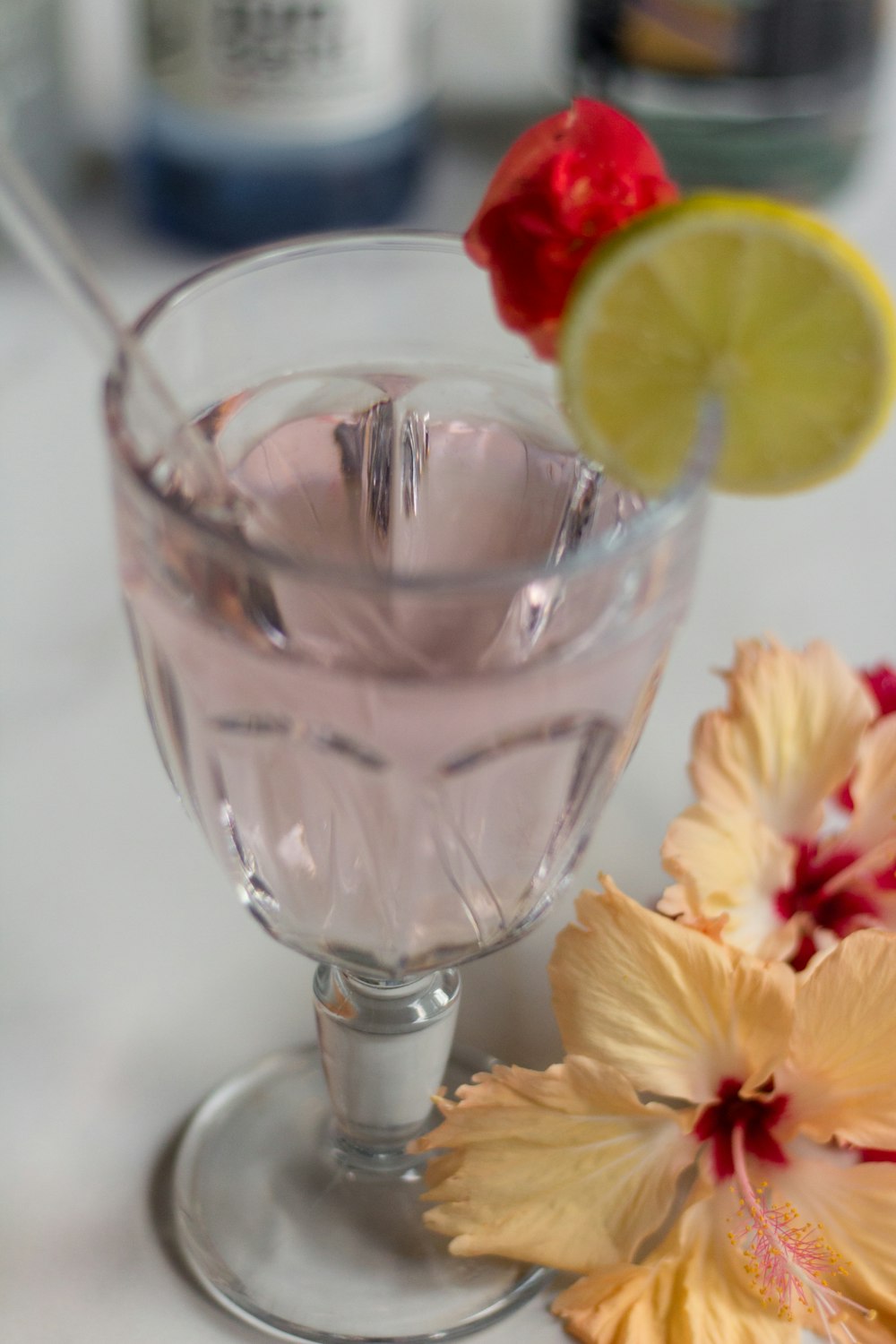 clear wine glass with red liquid