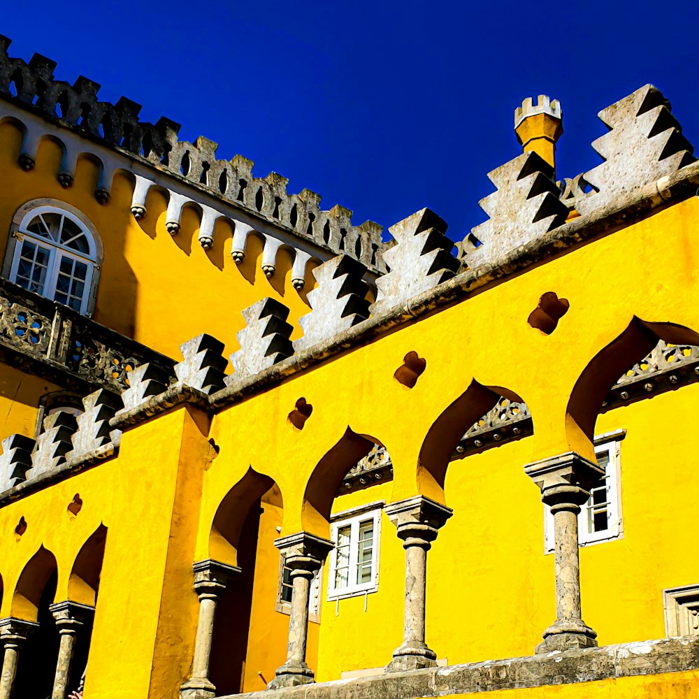 yellow and white concrete building