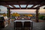 Outdoor patio transformation with built-in seating and ambient lighting