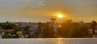 Sunset over the Dallas skyline with the Reunion Tower glowing warmly.