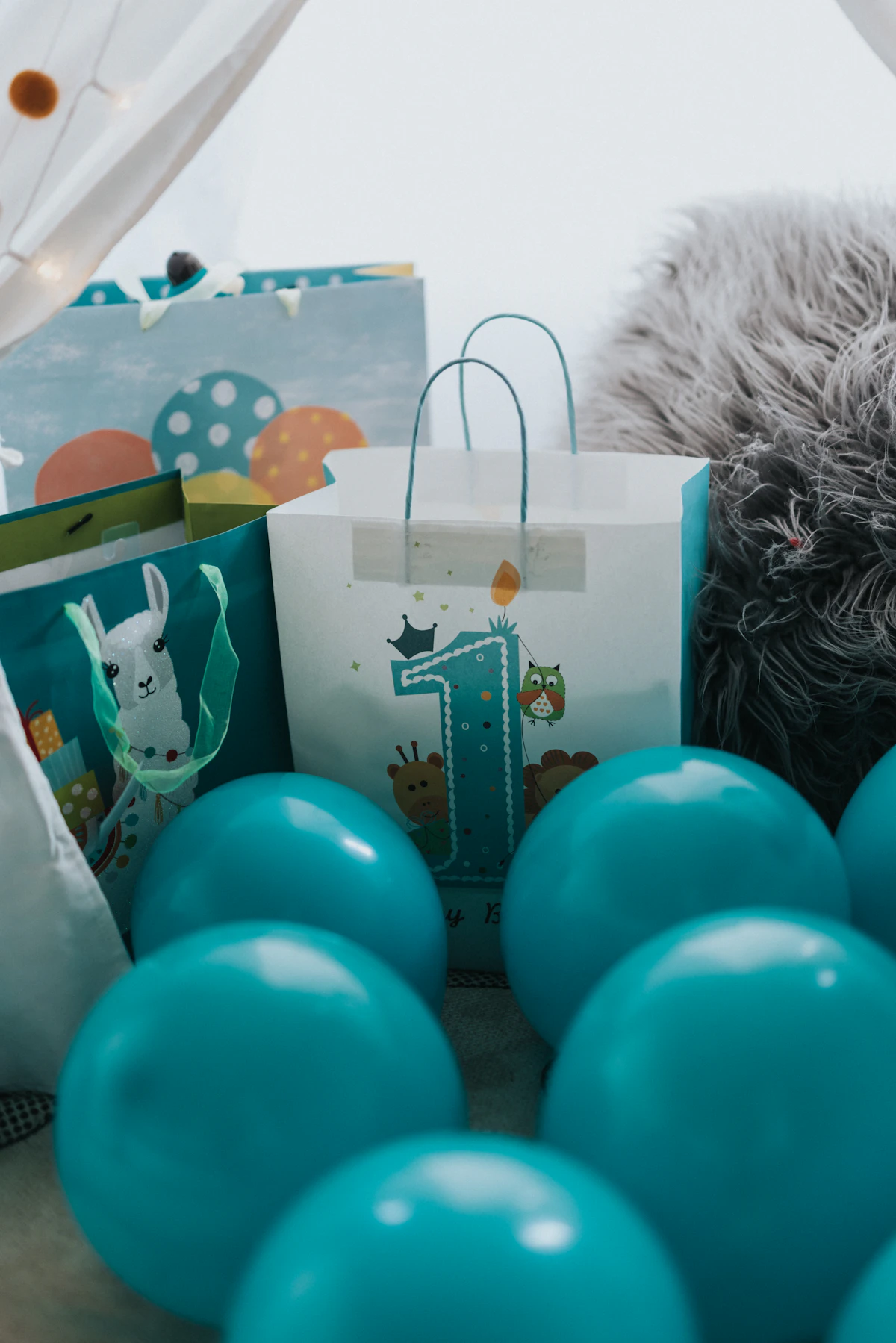 Birthday celebration with balloons and cake
