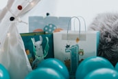 A festive room decorated with balloons and ribbons for a joyful first birthday.