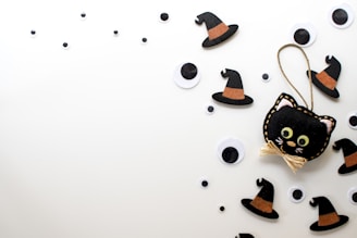 A collection of digital art featuring playful black cats.