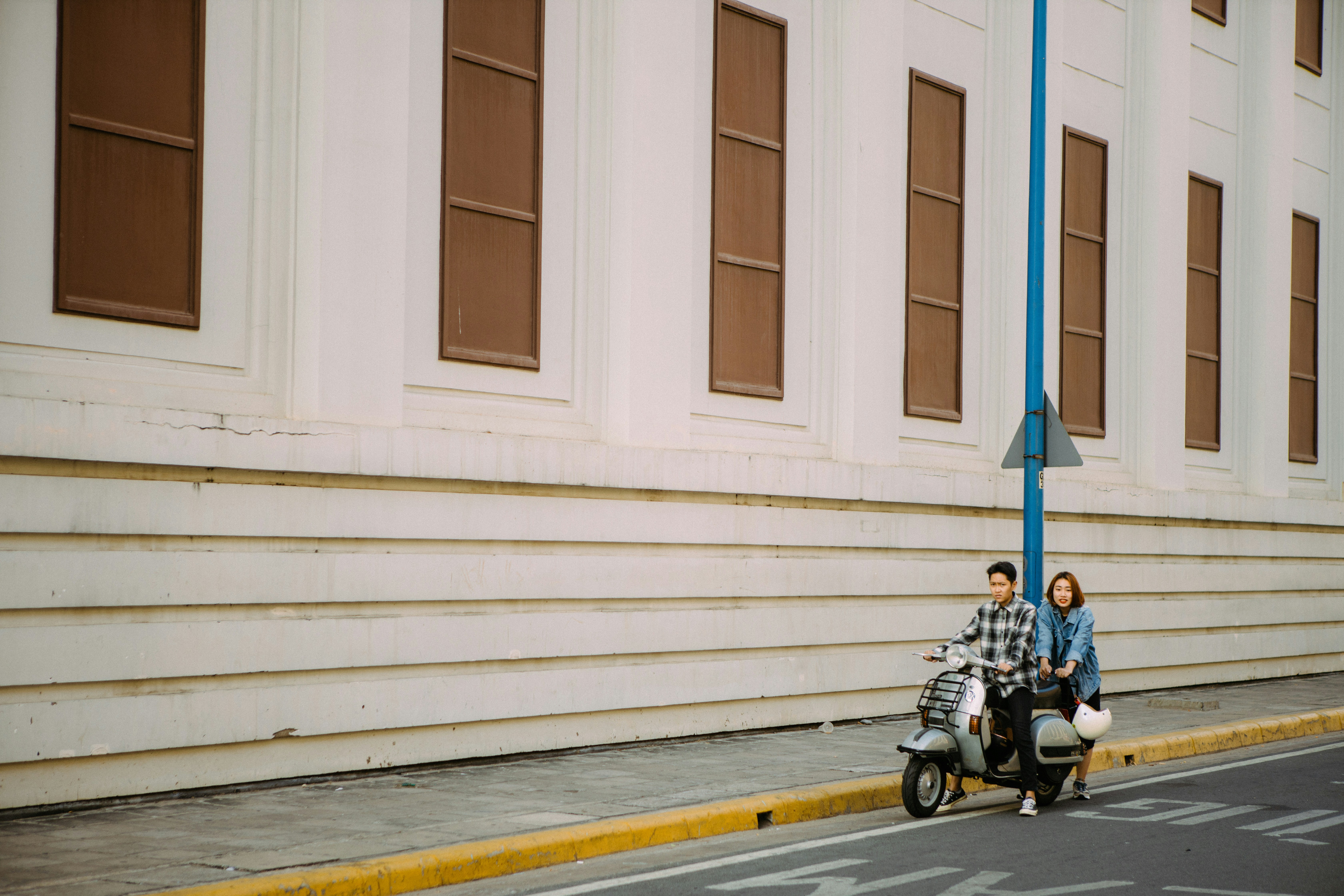 man in black jacket riding on motorcycle