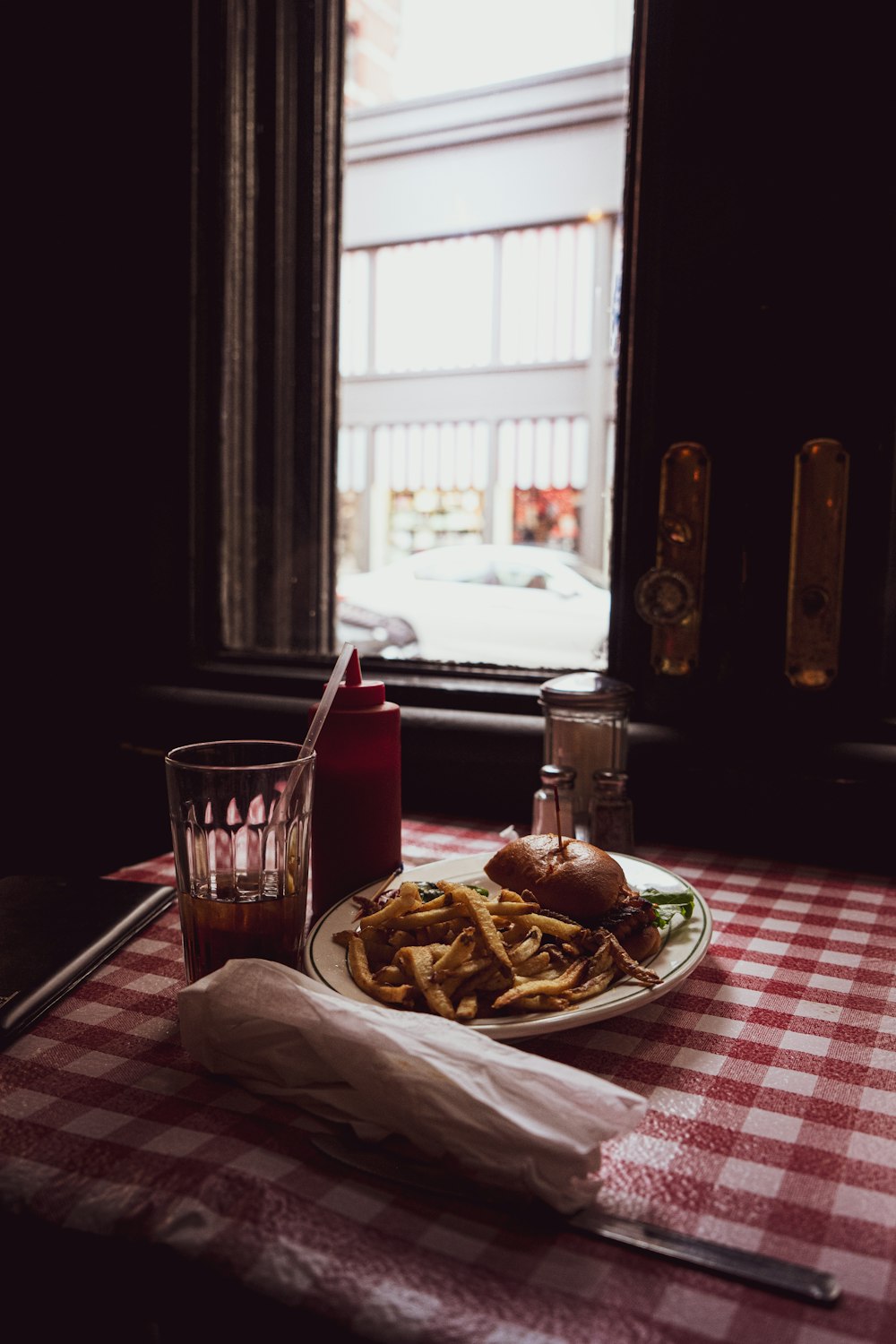 brown wooden chair near table