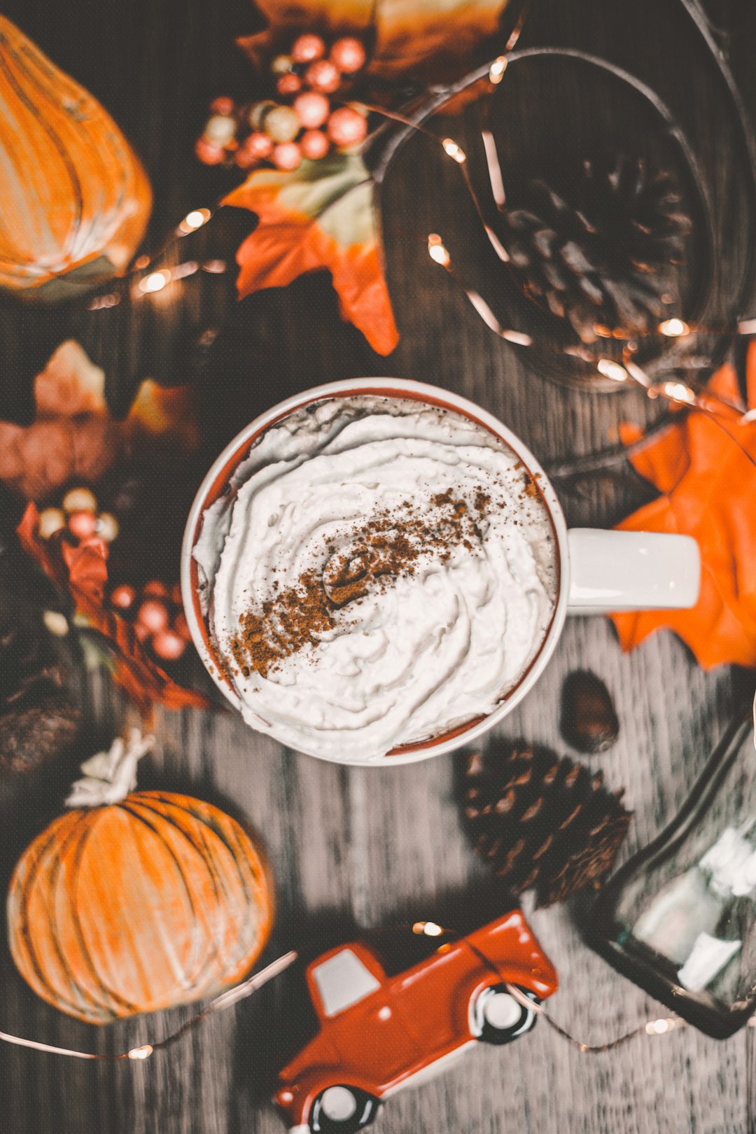 white ceramic mug on brown wooden table