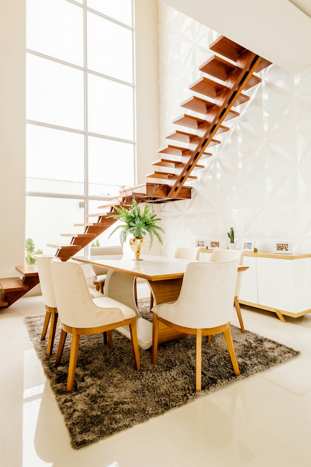 white wooden table with chairs