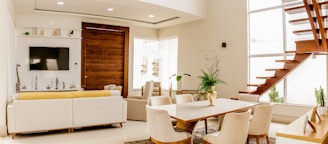 white sofa set near green indoor plant