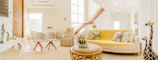 Bright living room in a Jaipur apartment blending modern design with traditional Rajasthani motifs.
