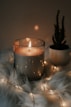white candle on clear glass holder