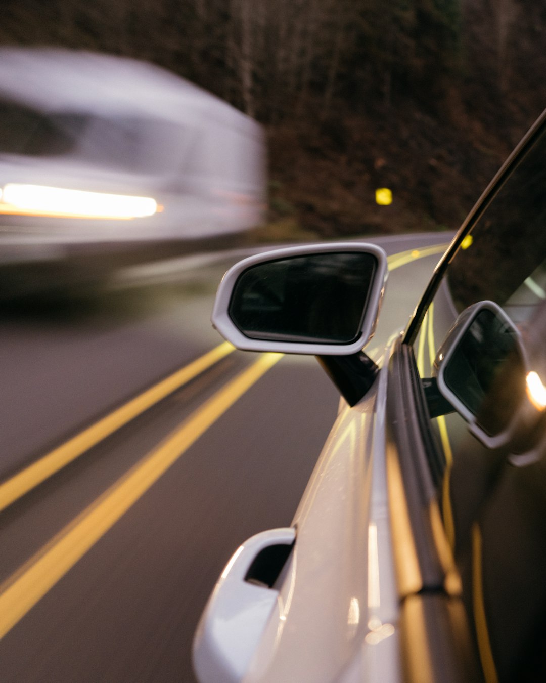 black car side mirror during daytime