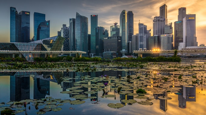 high rise buildings near body of water during daytime