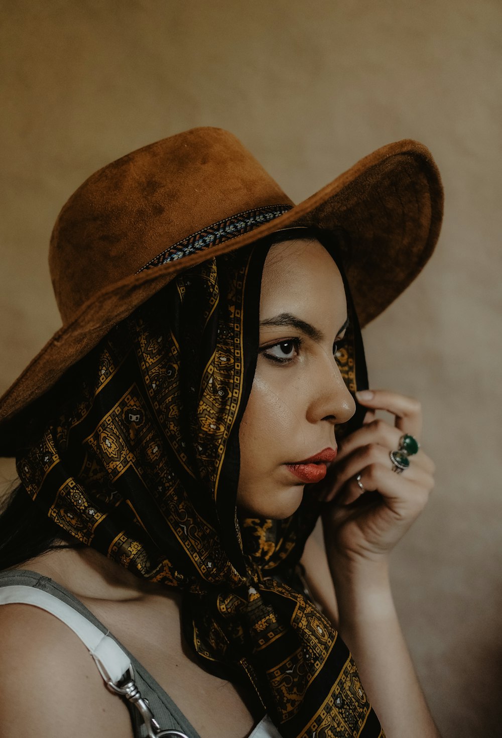 woman in brown and black hijab