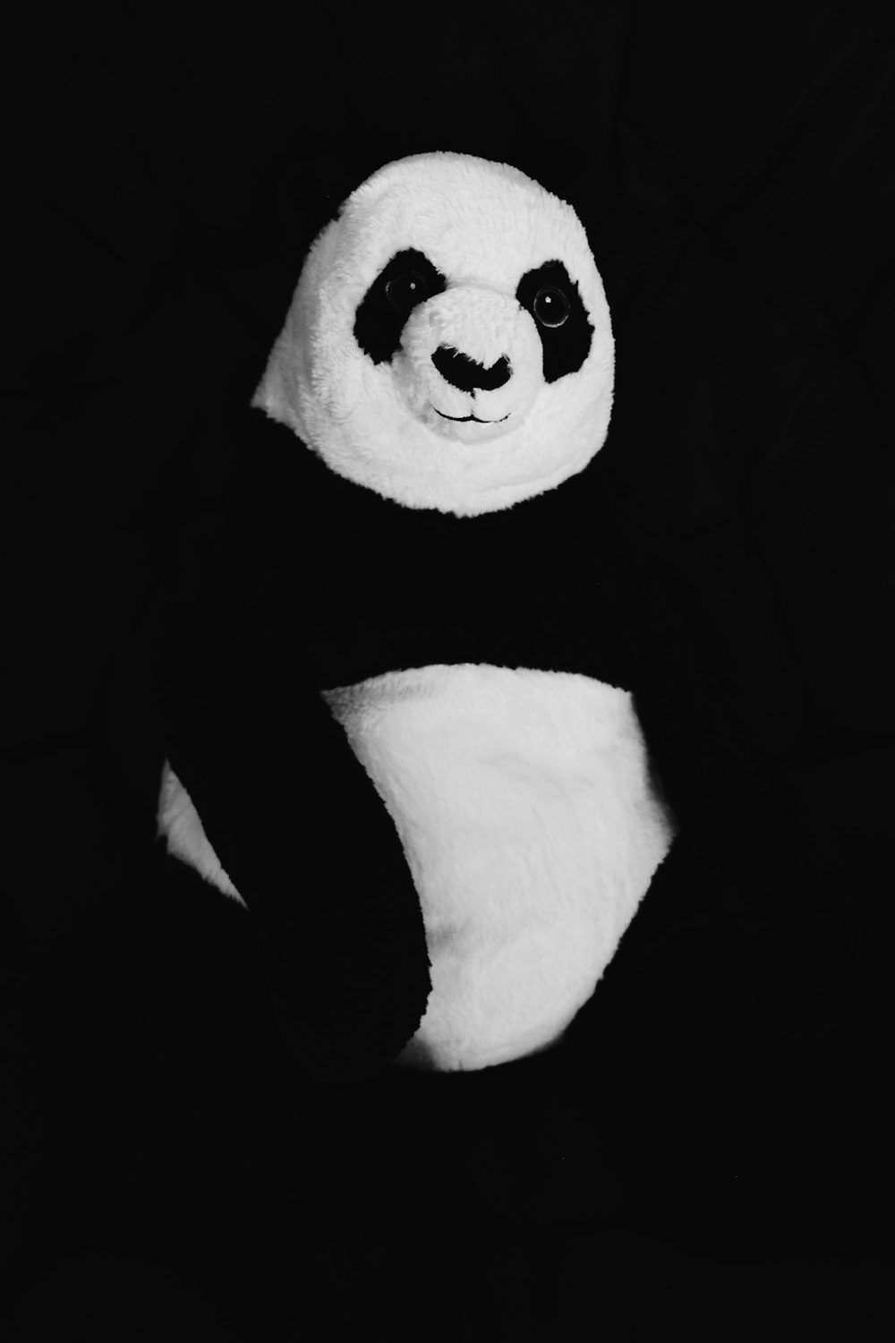 white and black panda plush toy