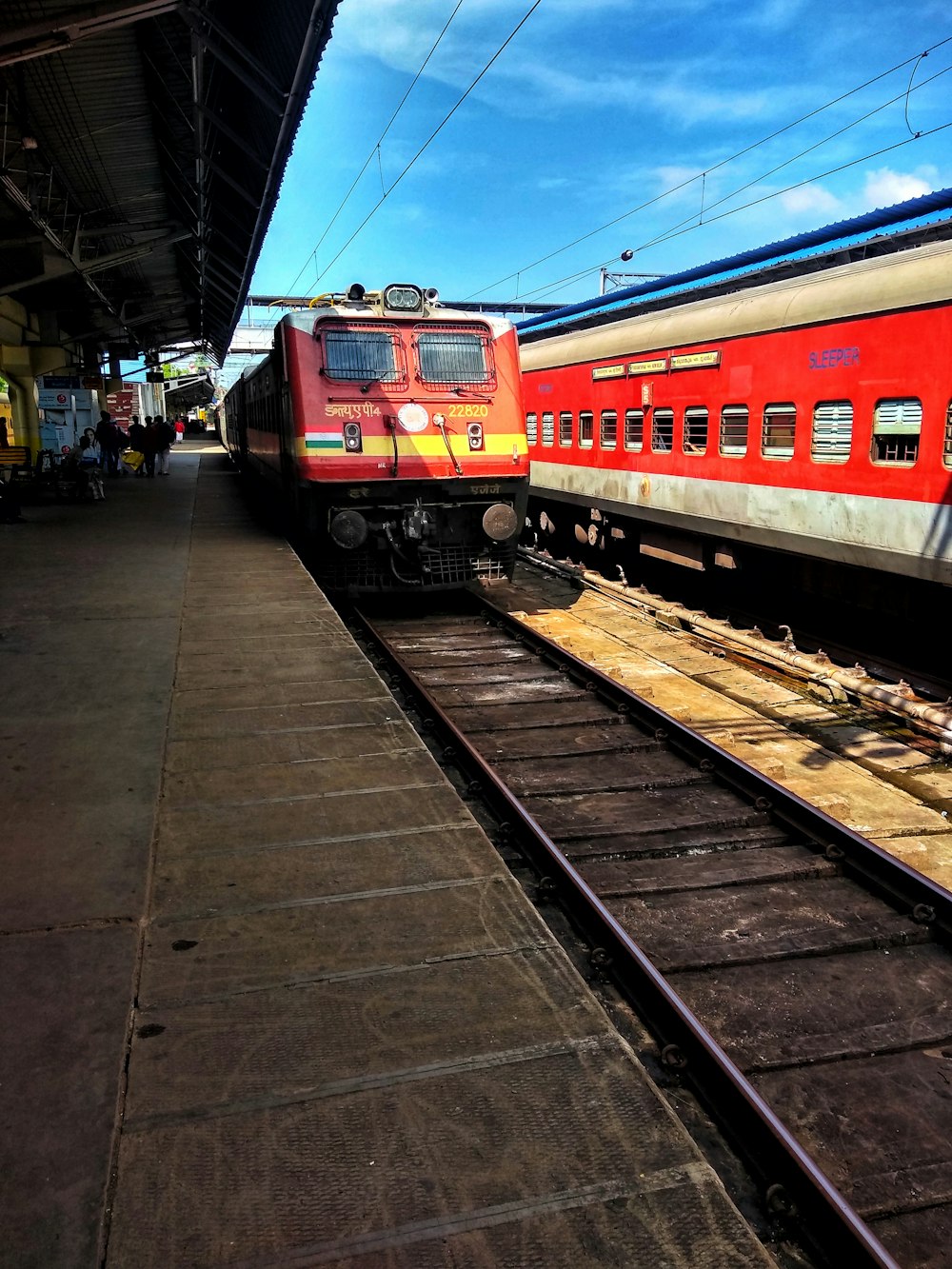 red and white train on rail