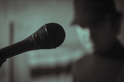 black microphone on white background