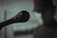 black microphone on white background