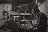 The band rehearsing in a cozy studio.