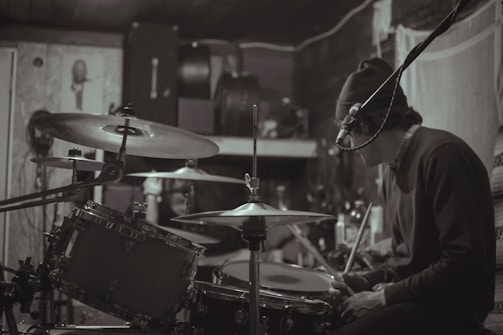 The band rehearsing in a cozy studio.