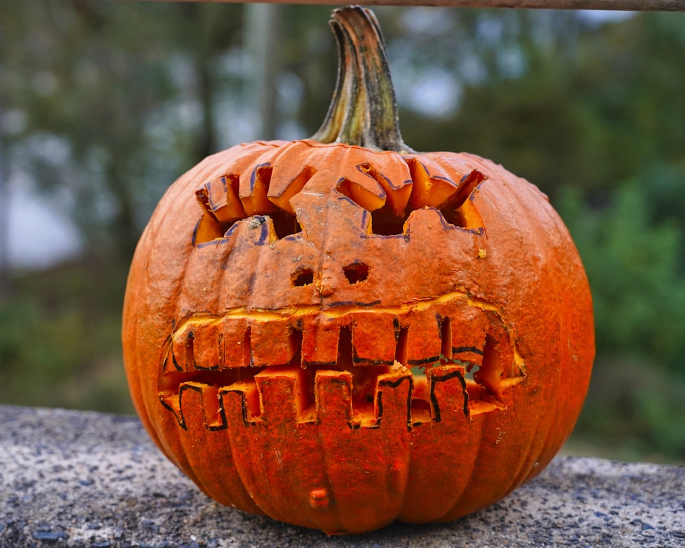 jack o lantern on gray concrete floor