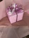 A beautifully wrapped birthday gift box with playful kids' patterns.