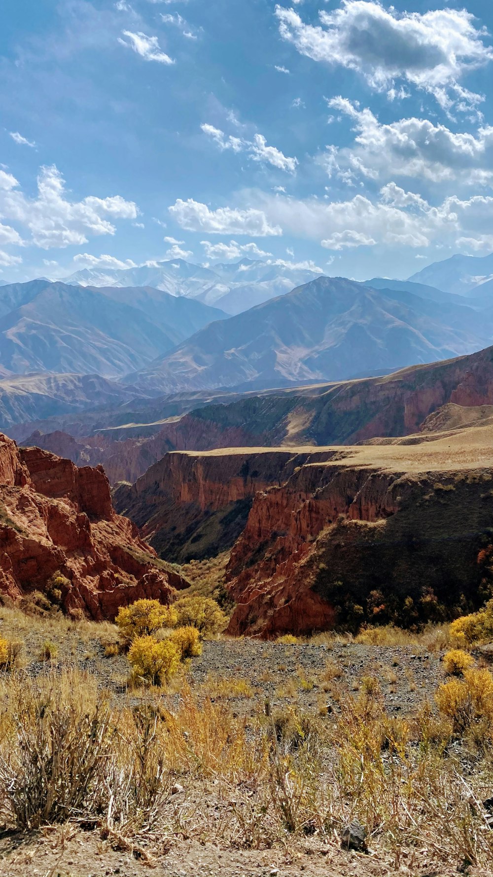 brown rocky mountain under blue sky during daytime