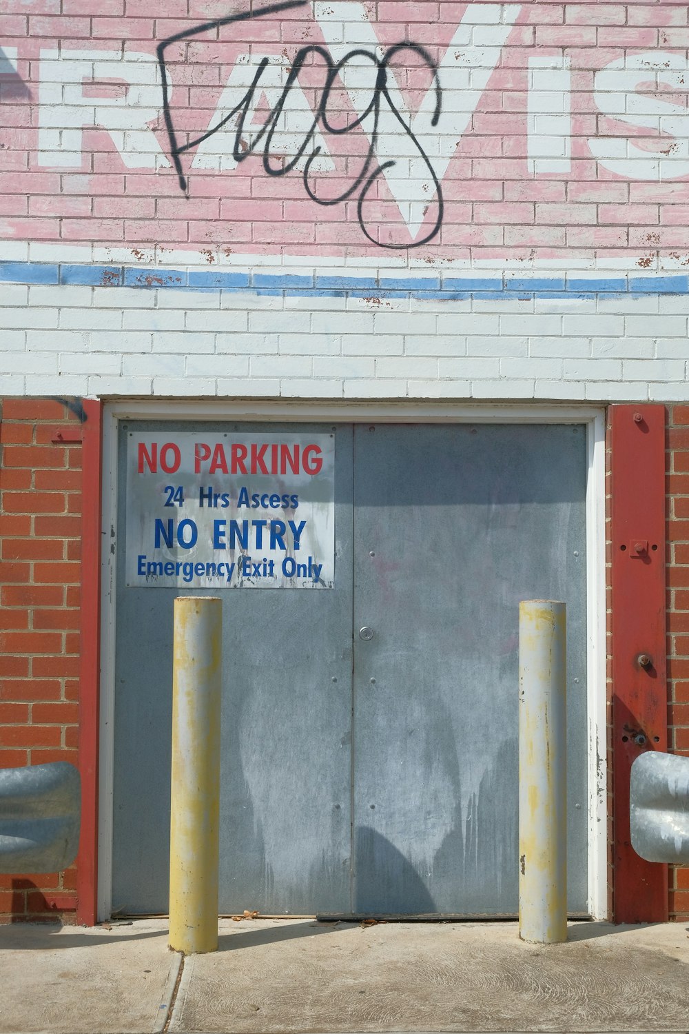 brown wooden door with blue and white signage